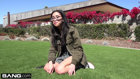 Nerdy Asian teen flashes her large tits in public